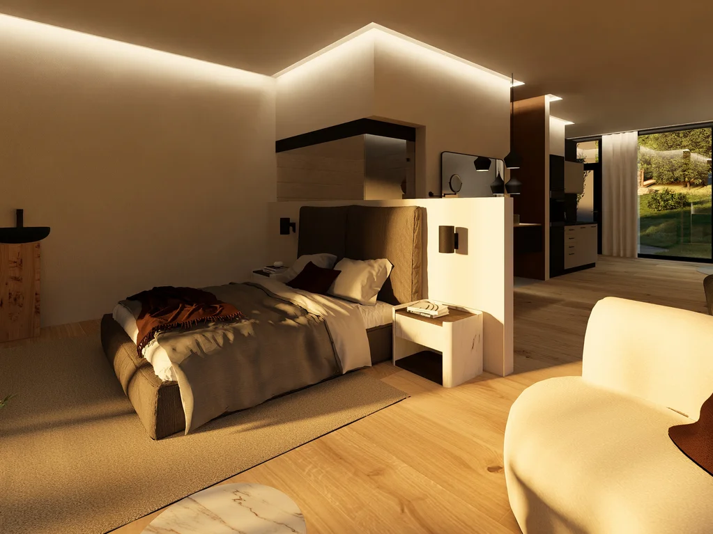Turm 1 Modernes Hotelzimmer mit Doppelbett, Sessel und großer Fensterfront mit Blick ins Grüne