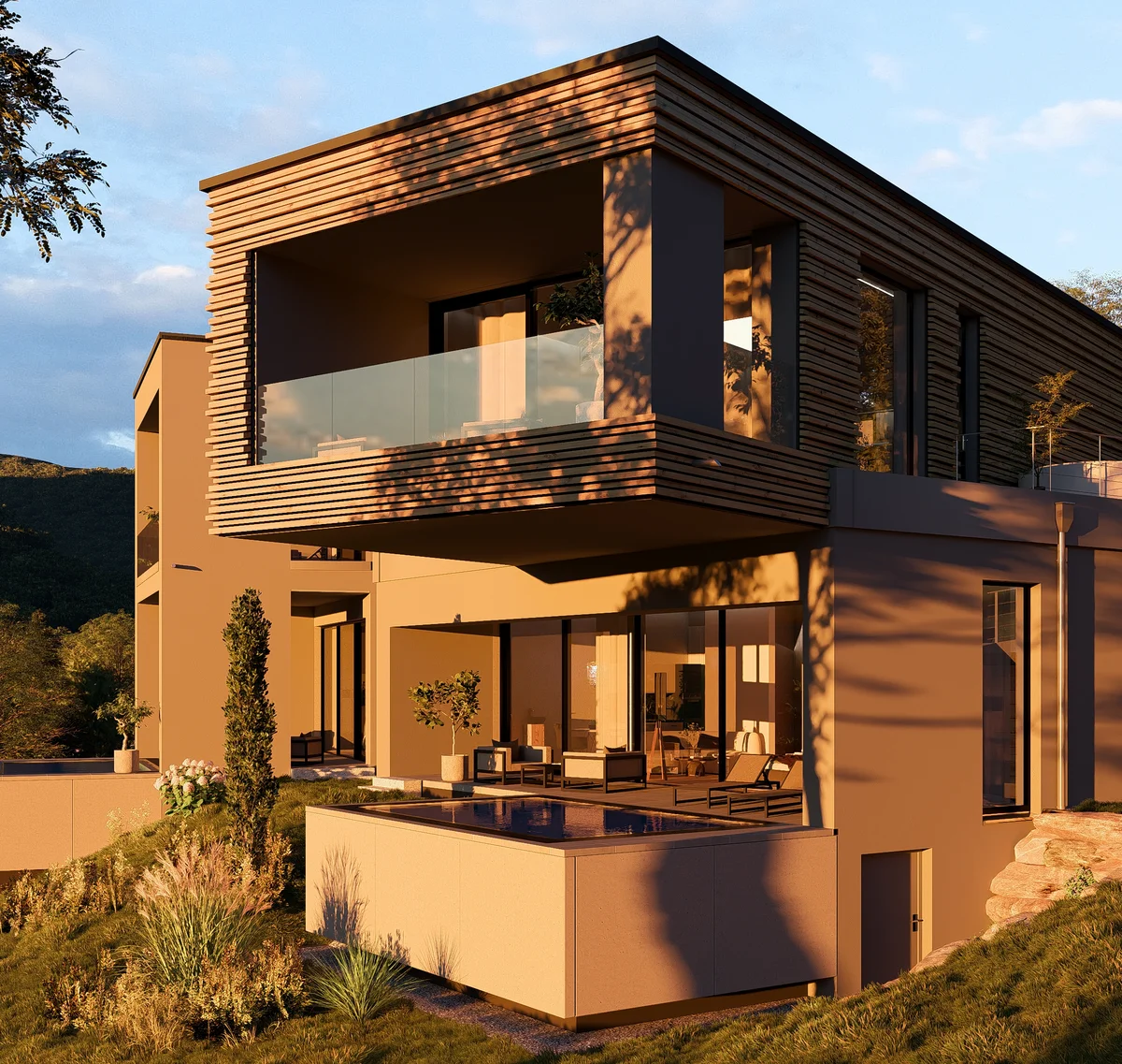 Cubea | Chalet-Apartments in Bodenmais für hohe Ansprüche Modernes Haus mit Holzverkleidung und Terrasse in grüner Landschaft bei Sonnenuntergang